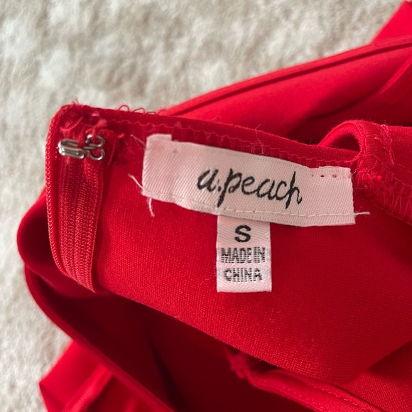 A.Peach Red Party Dress with Peekaboo Cut-out Detailing and Slit Size Small - Picture 4 of 5